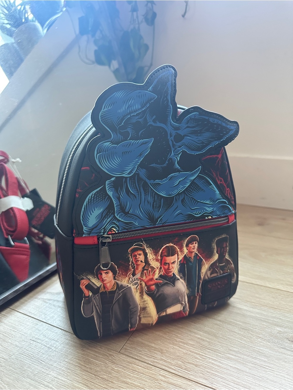 Black Stranger Things Themed Mini Backpack with Blue Graphic